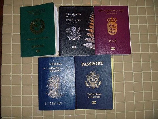  Passports of various nations, including Denmark, top right; New Zealand, top middle; and the United States, bottom right. 